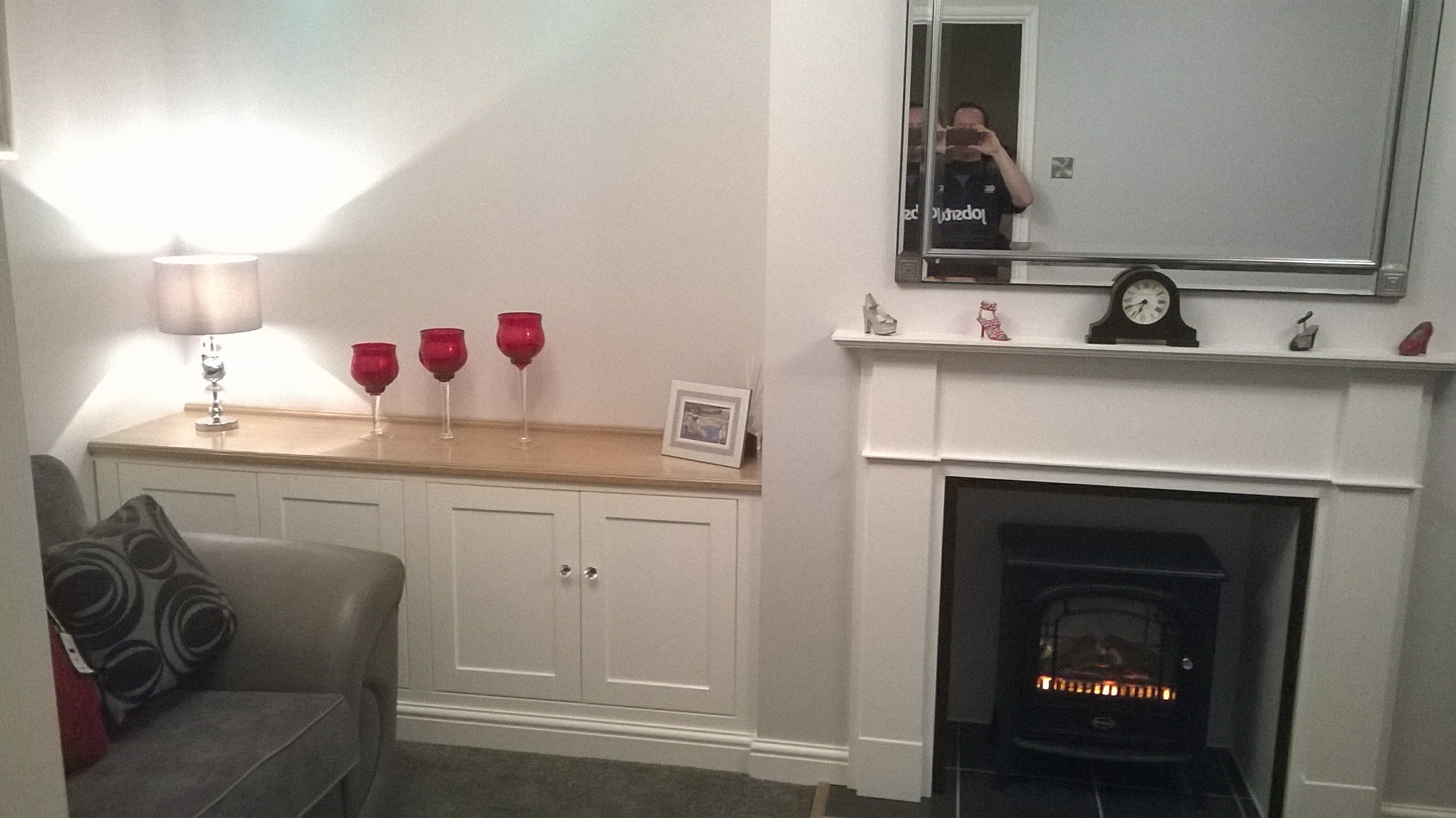 bespoke fireplace and cupboards built and fitted