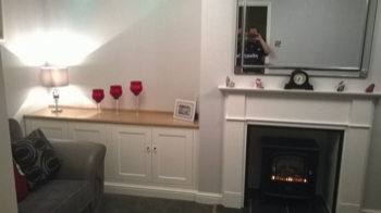 bespoke fireplace and cupboards built and fitted